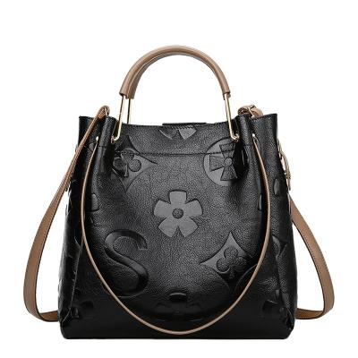 China Large capacity genuine leather handbag high quality vintage pattern floral ladies handbag office lady classic black casual bag famous brand for sale