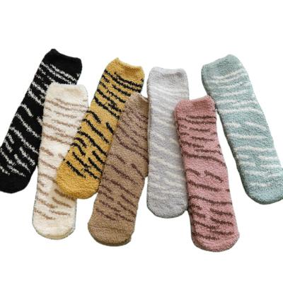 China Warm home custom tube socks thick print QUICK DRY coral leopard pattern socks winter cotton socks ladies fleece socks for sale