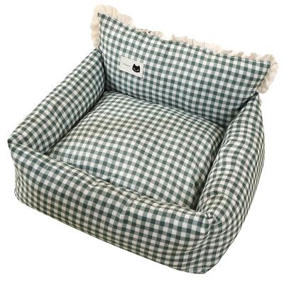 China Sustainable Winter Enclosed Warm Sofa Nest Green Plaid Pet Sofa Cushion for sale