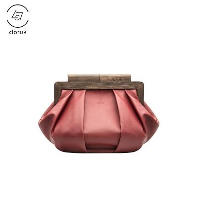 China Iona Bag factory direct natural wood bag clutch leather handle large branded handmade dust bag for sale