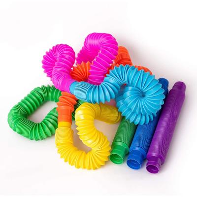 China Other Squishy Person Tube Sensory Toys Set Plastic Compression Strench Magic Sound Tubes for sale