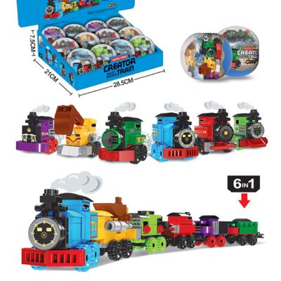 China 12pcs/set Egg Train Car Brick DIY Model Building Educational Toys Toy Magnetic Train Set Construction Surprise For Kids Hotsale for sale