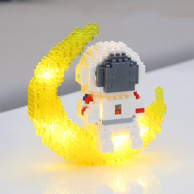 China Eco-friendly Material Astronaut Moon Model Mini Building Blocks Toys With Led Igniting Outer Space Astronauts Model Building Kits Compatible With Nano for sale