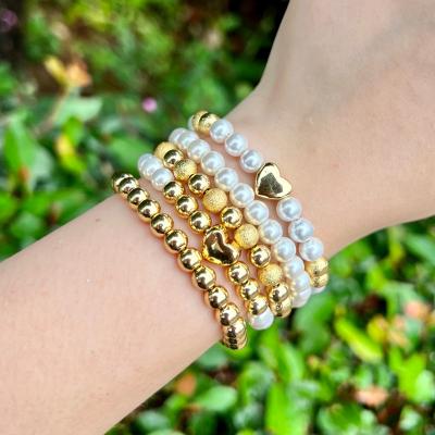 China FASHIONABLE Ladies Gold Plated Heart Charms Bead Bracelet Ball Jewelry Adjustable Gold White Pearl Handmade High Brass Copper Polished Fa for sale