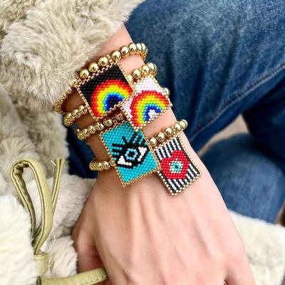 China Trendy Eye Heart Rainbow Bead Copper Smile Fashion Charm Bracelet Miyuki Bead Adjustable Set Bright Simple Color For Gifts for sale