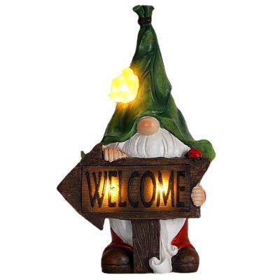 China Europe 10 Inch Green Gnome Figurine Garden Welcome Sign Hat With Solar Elf Light Statue for sale