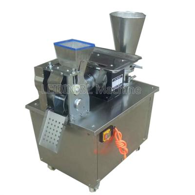 China automatic samosa making machine/dumpling machine/momo machine 750*520*850mm for sale