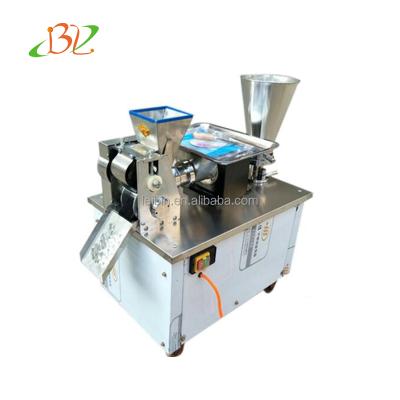 China high capacity automatic imitate hand make punjabi samosa making machine 4800pcs/h for sale