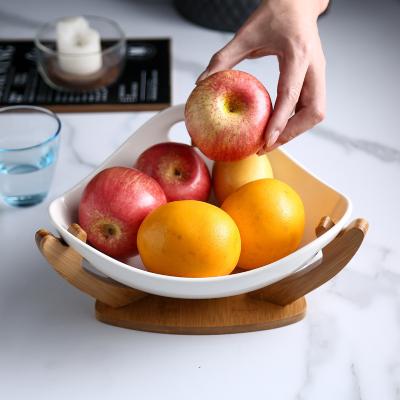 China Sustainable modern white white salad bowl snack dish ceramic household salad fruit dish triangle shape with wooden stand for sale