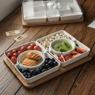 China Stocked Eco-friendly White Ceramic Rectangle Appetizer Dishes Compartment Dish Nuts Dessert Snack Dish With Lid for sale