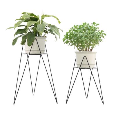 China Metal Iron Wire Planter Stand With The Creative Design Of Outdoor Decorative Style For Garden for sale