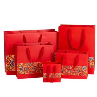 China Chinese Style New Year Handmade Traditional Pattern Printed Gift Bag With Wide Rope Paper Tote Handbag for sale