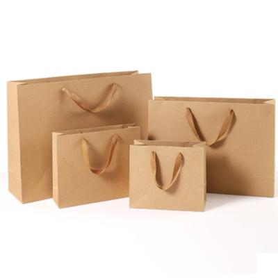 China Recyclable Large Brown Vertical Paper Bag Promotion Custom Logo Package Gift Clothing Packaging Bag for sale