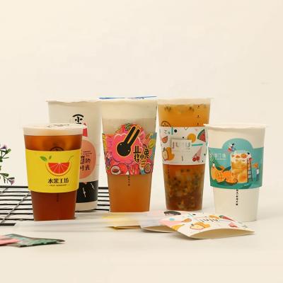 China Custom Printed Recycled Materials Milktea Cup Holder kpop Cup Holder Bubble Tea Cup Sleeve Coffee Sleeves for sale