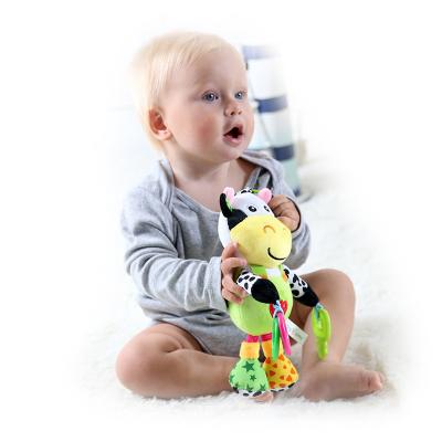 China Baby Music Eco-friendly Material Cow Stuffed Toys Well Selling Product Baby Crib Soothing Toy With Teether for sale