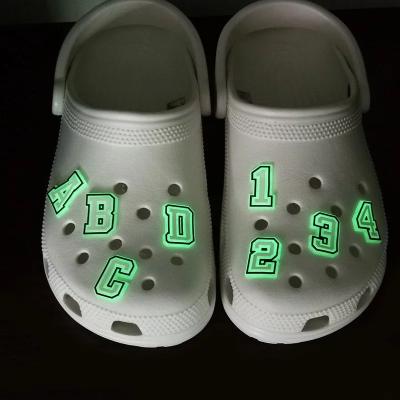 China Wholesale Glowing Hinder Charm In Dark Shoe Lace Croc Charms Glow Charms Hinder Soft PVC Shoe Decoration Letters and Numbers for sale