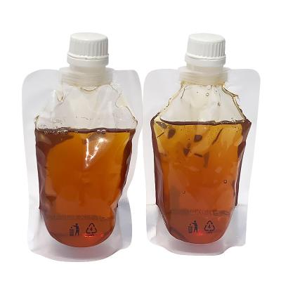 China Recycled Materials Factory Stand Up Spout Pouch 100ml 200microns PE Lid PET Special Clear Plastic For Drink Juice And Honey Packaging Bag for sale