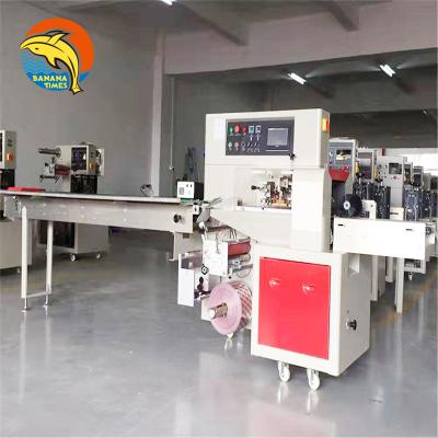 China Automatic Food Factory Price Wrapping Machinery Paper Packaging Machine for sale