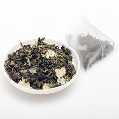 China Chinese Triangle Top Tea Bags Loose Leaf Tea Grade Iced Tea Peach Oolong Fruity White Tea Bag for sale