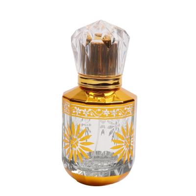 China Cosmetic High Grade 50ML Gold Etched Pressed Spray Glass Perfume Bottle Europe And USA Luxury Light Glass Crafts for sale