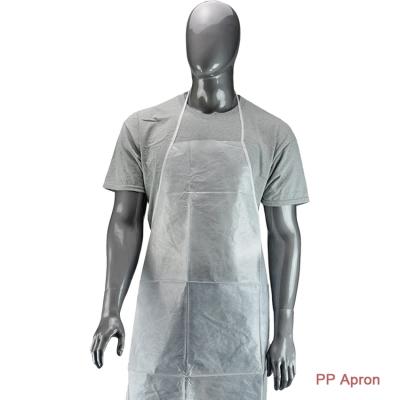 China Protective Nonwoven Waterproof Apron Cleaning PP Disposable Apron PE Disposable Apron for sale