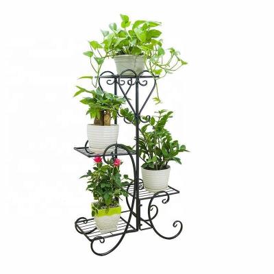 China Modern Minimalist Indoor Metal Flower Rack Shelf Garden Planter Metal Art Modern Display Iron Plant Rack Shelves for sale