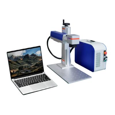 China Laptop Laser Marking Split Type Max 20w Fiber Laser Marking Machine With D50 Rotary Shaft For Ring for sale