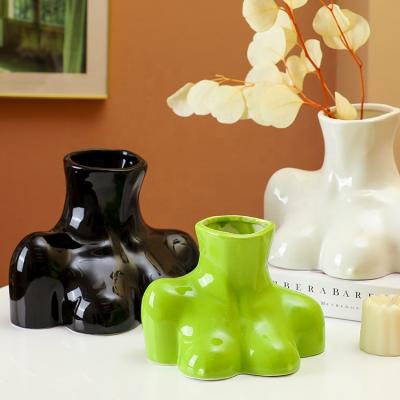 China Minimalist luxury ceramic half-length human vase for sale