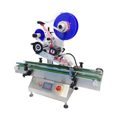 China Kelier 2021 Hot Selling Automatic Food Adhesive Sticker Paging Box Cardboard Bags Flat Surface Labeling Machine for sale