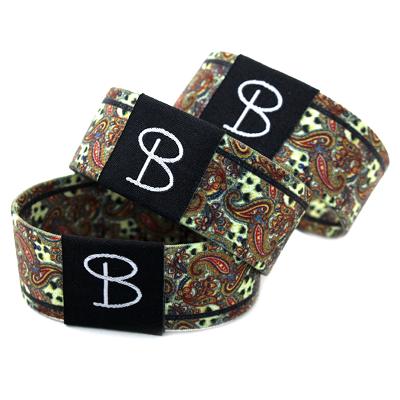 China Custom Style Polyester Sublimation Printing Wristband Chinese National Sport Wrapping Wristband for sale