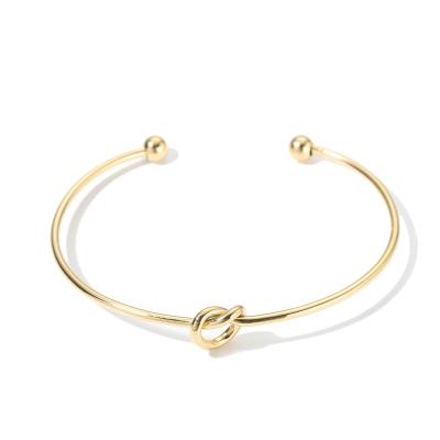 China New Fashion Lead Free Women's Minimalist Knot Shape Gold Bangle Bracelet, High Quality Gold Plated Bracelet for sale