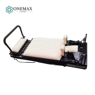 China ONEMAX Pilates Foldable Wooden Pilates Home Reformer Pilates Home Foldable Suction Reformer for sale