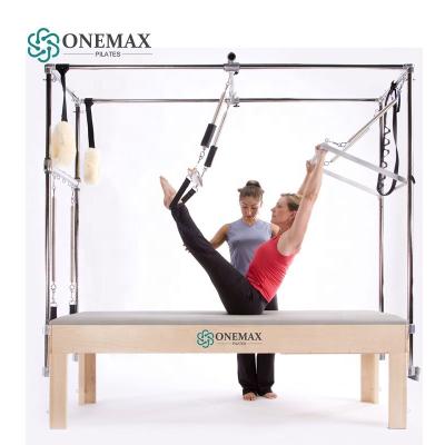 China Exercise Fit ONEMAX Pilates Home Body Reformer with Trapeze Wood/Aluminum Pilates Reformers with Cadillac Pilates Tower for sale