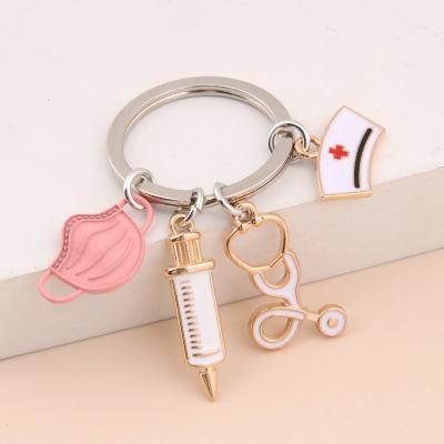 China New Doctor Keychain Medical Tool Metal Key Chain Key Ring Injection Syringe Stethoscope Nurse DIY Gift Medical Jewelry for sale