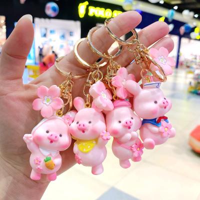 China Resin Cute Flower Pig Keyring Sakura Piggy Keychain Cartoon Carrot Flower Toy For Women Couples Backpack Car Charm Key Chains Pendant Gifts for sale