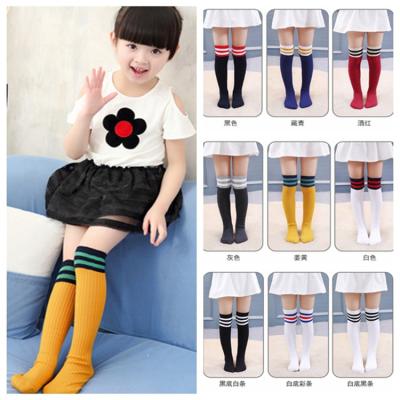 China Kids Athletic Knee High Spring Sport Hogs School Students Girls Boys Football Bars Cotton Socks for sale