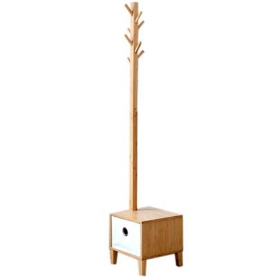 China Modern bamboo can sit on the shoe-changing stool and store creative fabric clothes and hat rack at the door. Bamboo multilayer shoe for sale