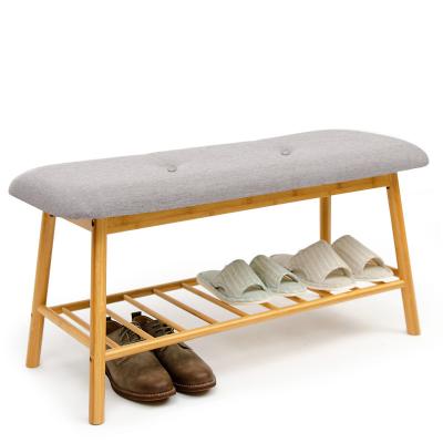 China Modern bamboo can sit on the shoe-changing stool and store creative fabric clothes and hat rack at the door. Bamboo multilayer shoe for sale