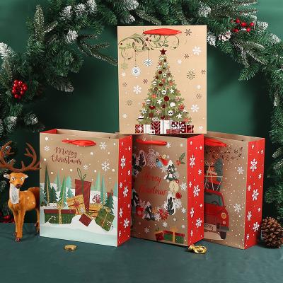 China Wholesale Handmade Christmas Wrapping Paper Gift Bags Craft Bulk Paper Packaging Bag Paper Clothing Gift Wrapping Bags for sale