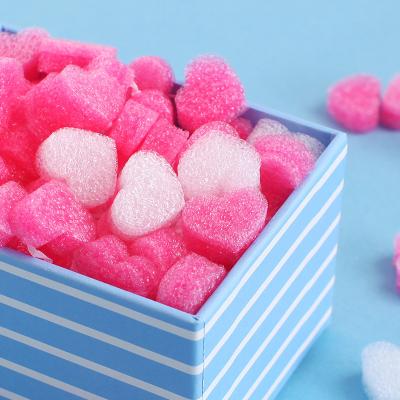 China Creative Recycled Materials Candy Happy Box Stuffing Love Stuffing Packaging Material Gift Box Foam Heart Shaped Ball for sale