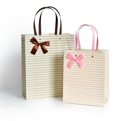 China Recycled materials paper bags are specially designed as stock gift bags for sale