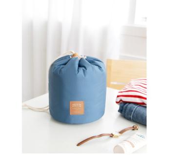 China High Quality Large Capacity Travel Wash Storage Bag Outdoor Waterproof Fashion Multifunctional Cylindrical Cosmetics Bag Or Pouches for sale