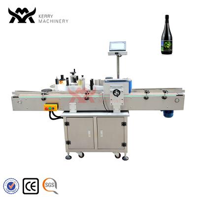 China Food/aerosol automatic adhesive sticker labeling machine beer vibratory labeling machine for sale