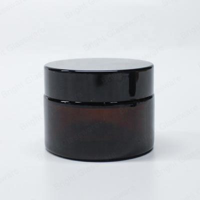 China Luxury Empty Facial Cream 1oz 2oz 4oz 16oz OEM Cosmetic Containers Customize Cosmetic Packaging Glass Cream Jar With Black Lid for sale