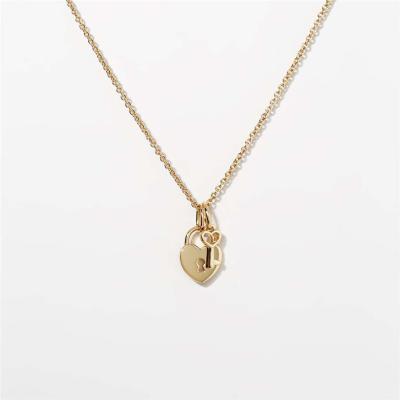 China Eco-Friendly Woman 18K Gold Plated Stainless Steel Heart Pendant And Key Custom Gold Pendent Necklace for sale