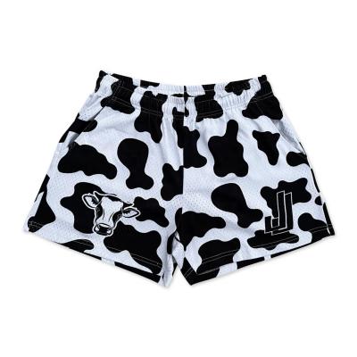 China Cowhide Sublimation Design Mesh Antibacterial Black White Basketball Shorts for sale