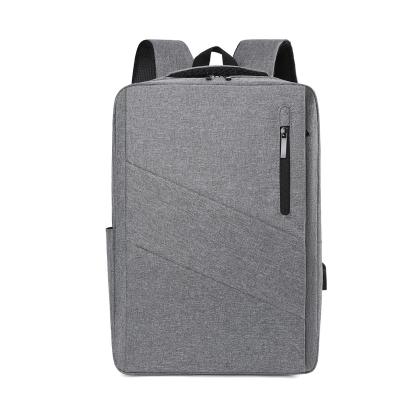 中国 wholesale business back pack with USB Charging port men computer laptop backpack 販売のため