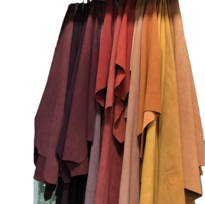 China Beautiful cheapest colorful stock cow split suede leather for shoes garment boots bags etc for sale