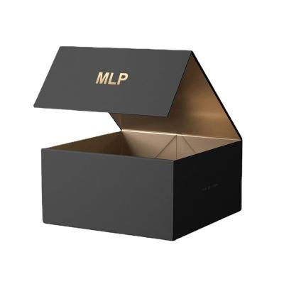 China Workable Customized Mold Customize Logo Printed Black Paper Flat Package Cardboard Clothing Cosmetic Shoe Foldable Magnetic Folding Gift Box for sale