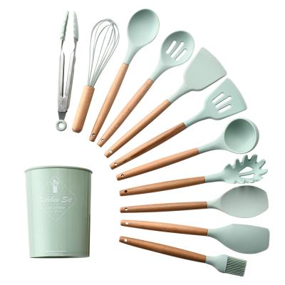 Cina Amazon best seller silicone kitchen utensils with beech handle kitchenware sets mint green cooking tools in vendita